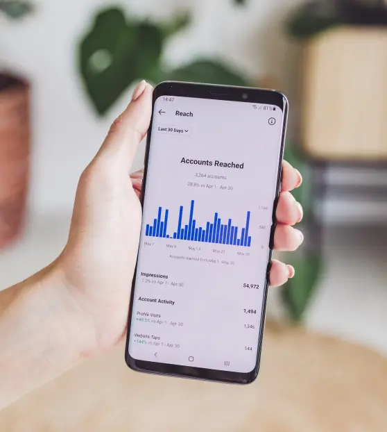 Phone displaying social media analytics graph