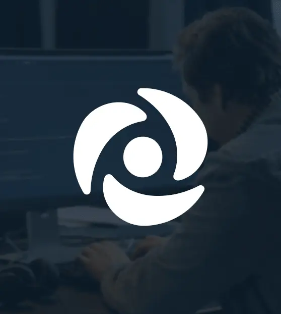 Man working at a desk with dutchie plus logo overlay