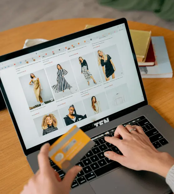 Online shopping with credit card and laptop