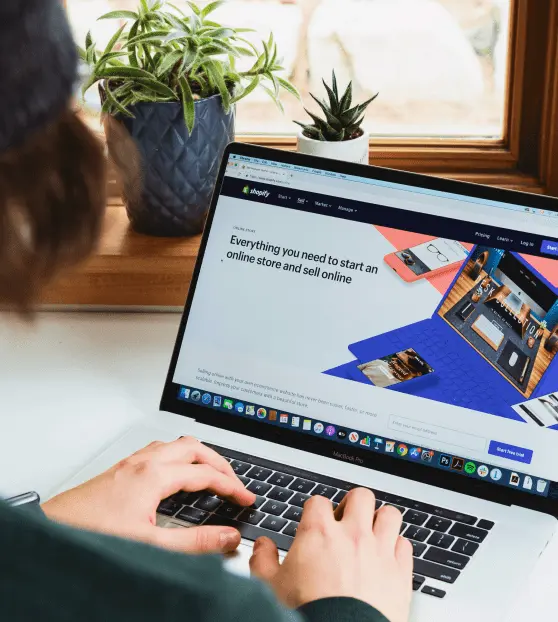 User browsing an online store on a laptop