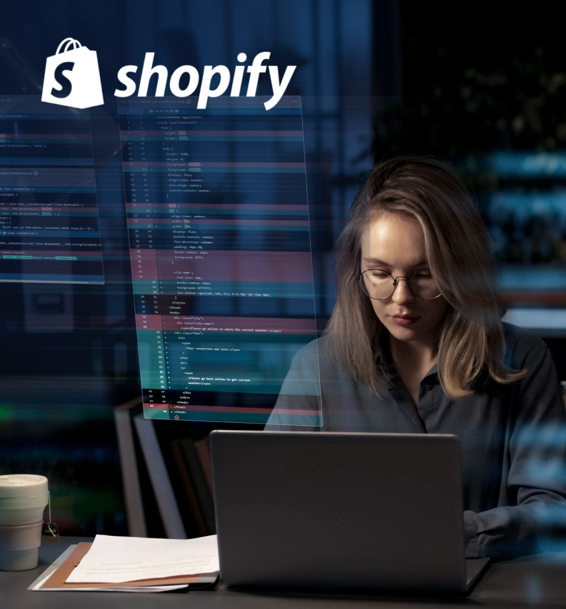 Female developer coding Shopify store on laptop at night
